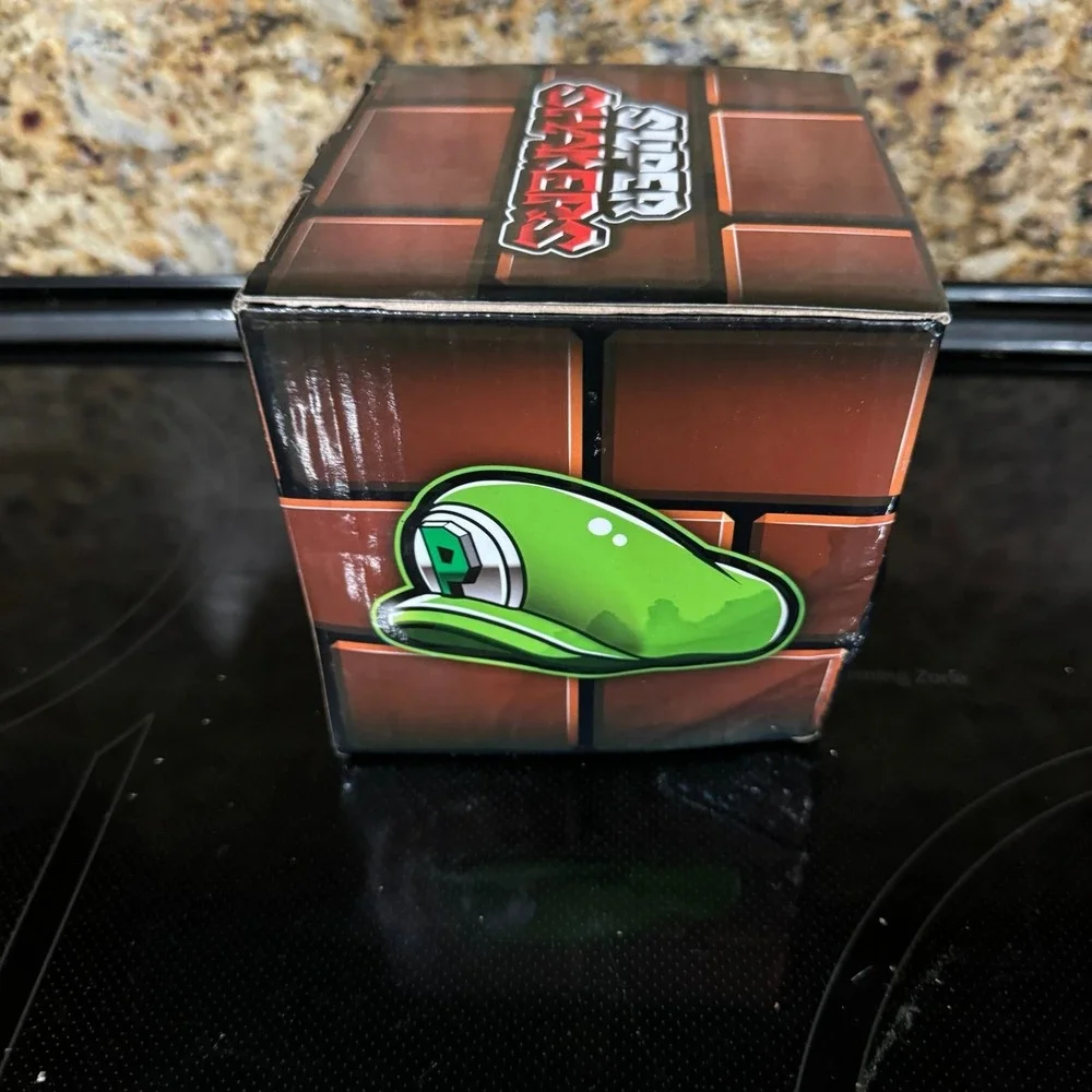 The Super Mario Bros. Salt & pepper shakers Mario & Luigi Hats set by Geek Fuel.
